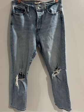 Levi’s Light Wash Distressed Ripped Jeans